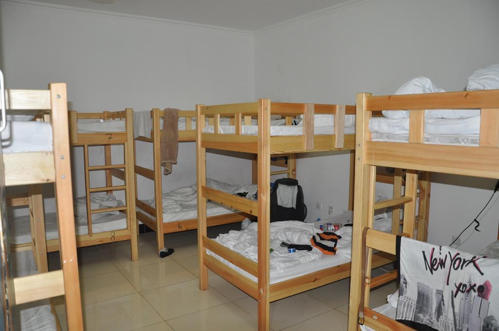 Three Legged Frog Hostel Beijing Rom bilde