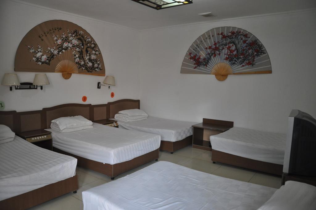 Three Legged Frog Hostel Beijing Rom bilde