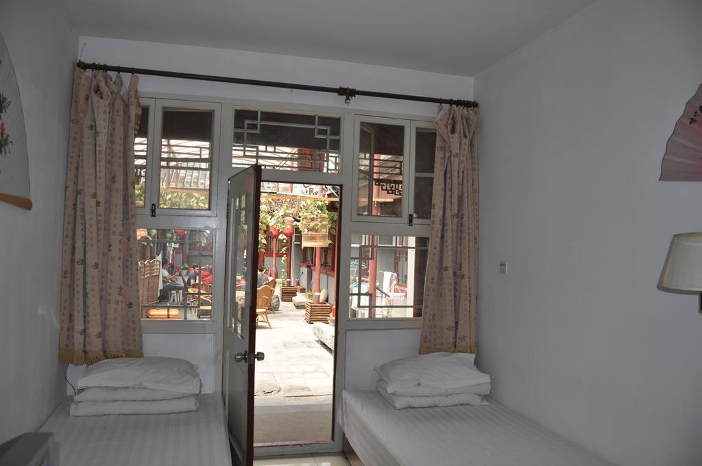 Three Legged Frog Hostel Beijing Rom bilde